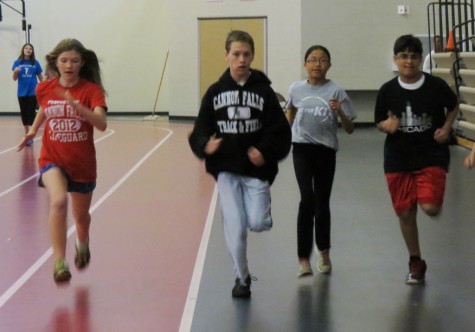 6th grade students get off the line quickly on the junior high track team