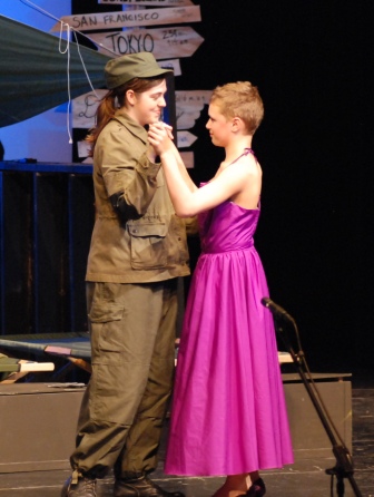Capt. McCarthy (Mary Ann McCusker) and Pvt. Klinger (Xander Weinreich) have two very different ideas of formal wear.