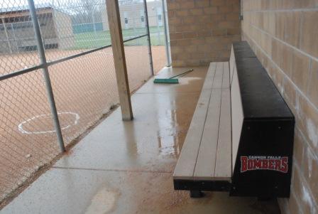 a forlorn-looking dugout during a recent rain-out