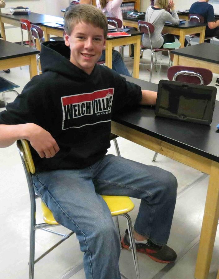Freshman Grant Schlichting shows off his new tablet