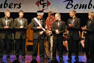 Carter Dombeck wears the crown and sash of the 2014 homecoming king