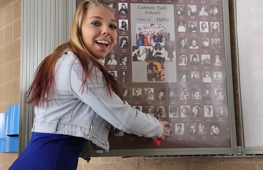 Katie Erhardt finds a picture of her mother in the atrium displays