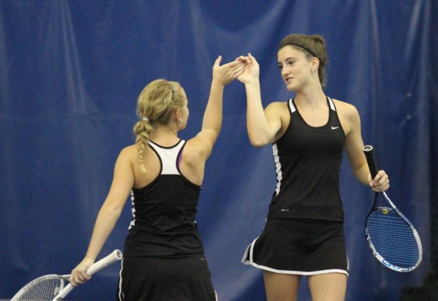 Maddie Adel and Tayler Banitt congratulate each other at the state tennis tournament