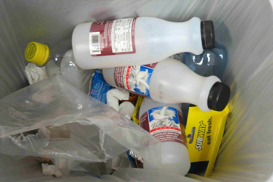 recyclable materials show up in garbage cans