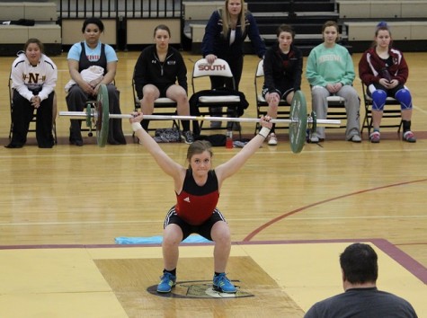 Kallan Wenborg shows the judges her form at the state tournament