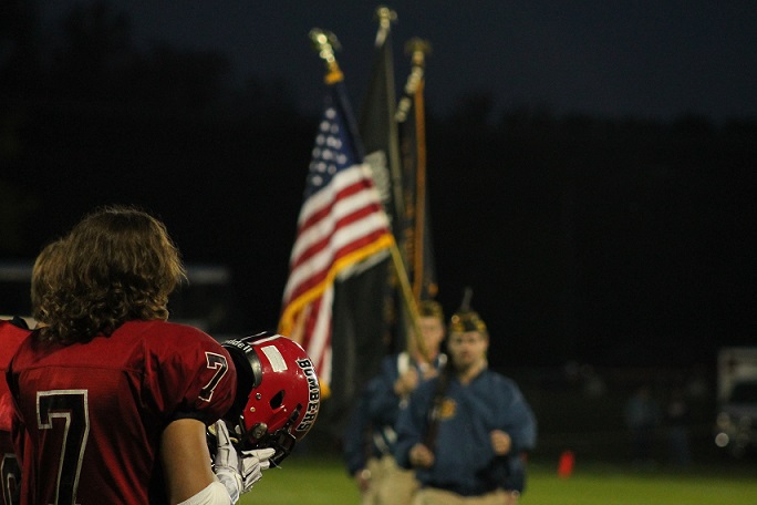 Mason Hofstedt awaits the color guard and the beginning of the game