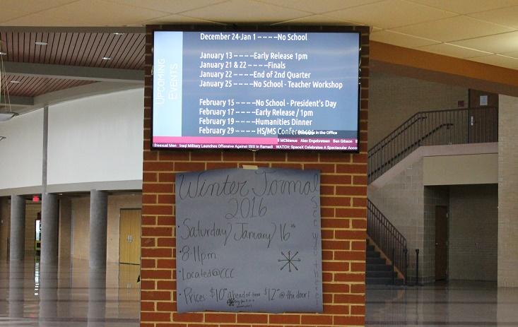 Video screens have been installed for information and security