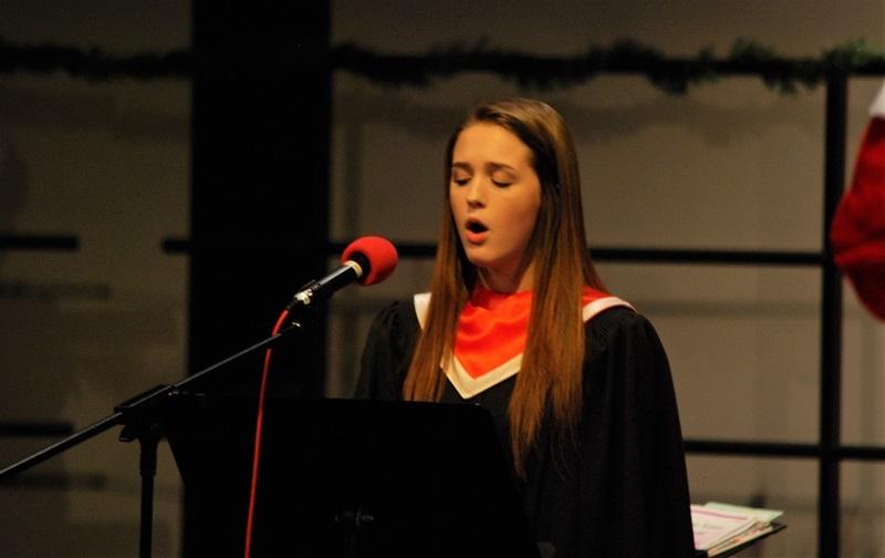 Aria Tennessen performs a solo at the holiday concert