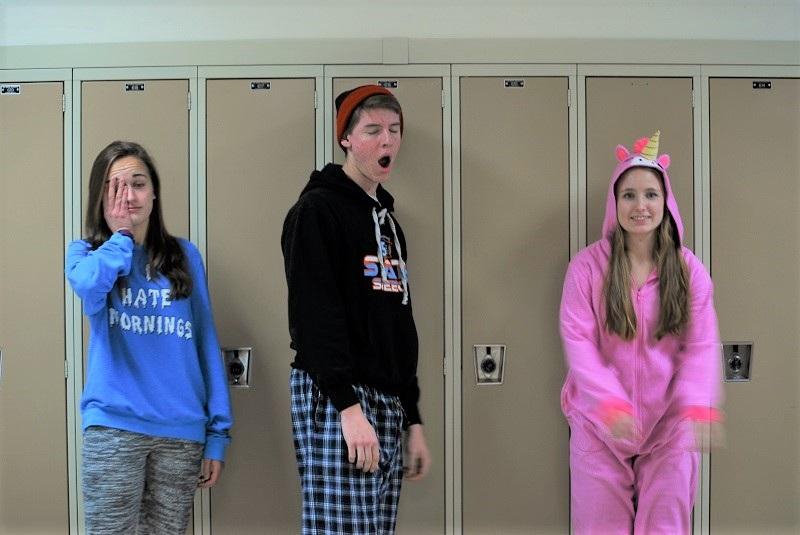 Three students demonstrate exactly how it feels to wake up on Christmas morning in high school.