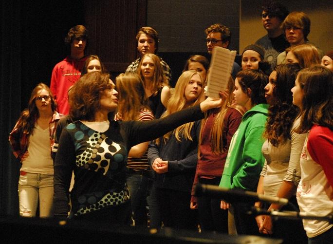 Director Sue Franke prepares her singers for the CFHS choir concert