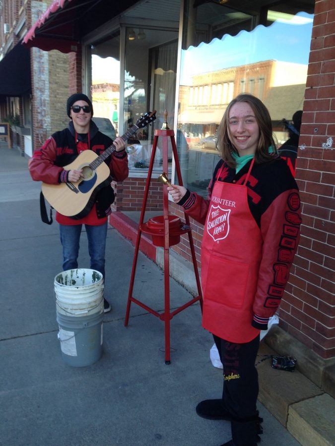 Molly Bowen and Nathan Van Zuilen provide some holiday music for donors