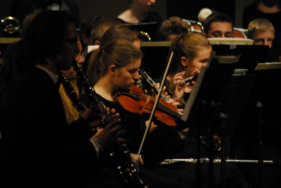 The high school concert band strikes up a tune at their annual holiday concert.