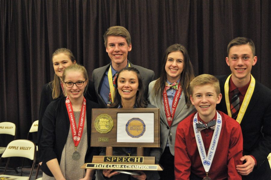The Cannon Falls HS state speech finalists pose with their state tournament trophy