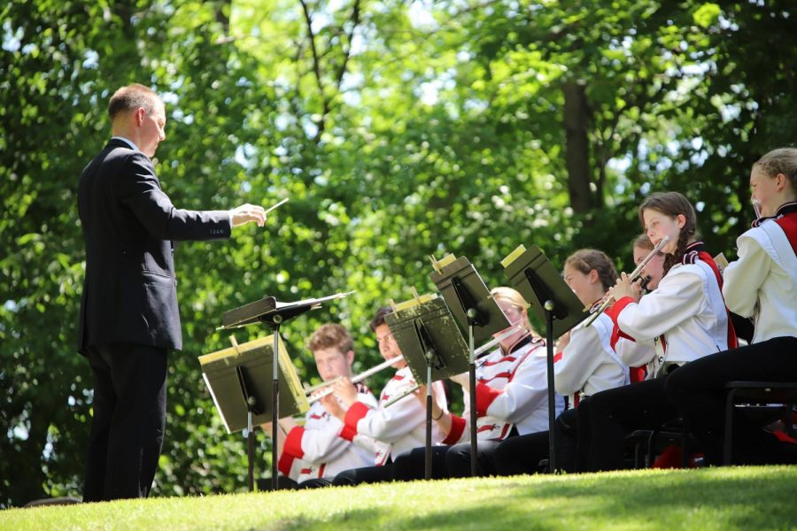 Mike Legvold leads the CFHS band during Memorial Day ceremonies