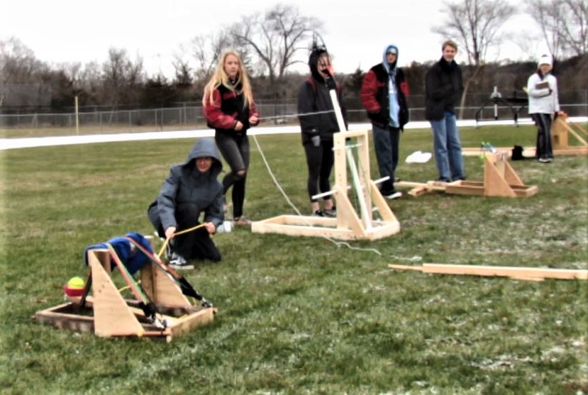 Amateur catapultists try their luck at a launch on the athletic field