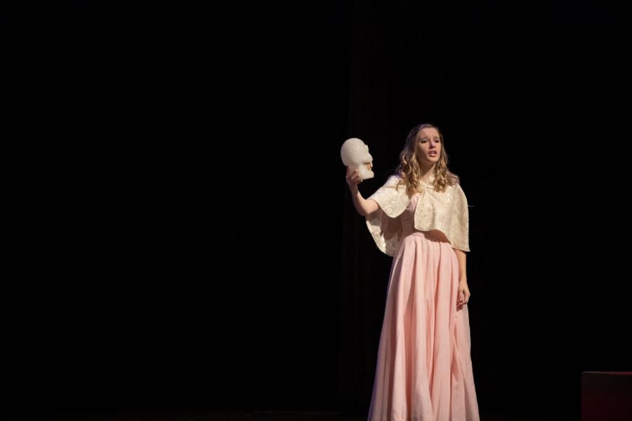 Kressin Hartl is forlorn on stage as she holds the skull of poor Yorick