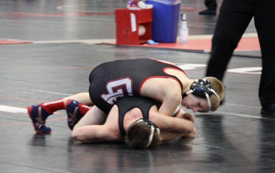 Cannon Falls pins opponent. 