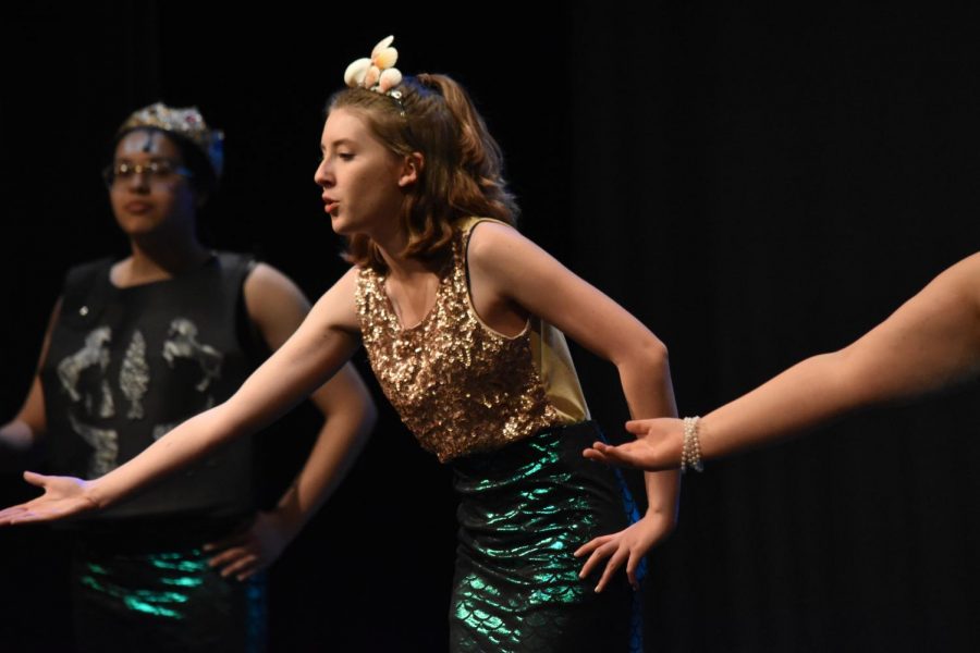 Bianca Caputo, who portrays one of Ariels sisters in the musical, focuses during the dress rehearsal.