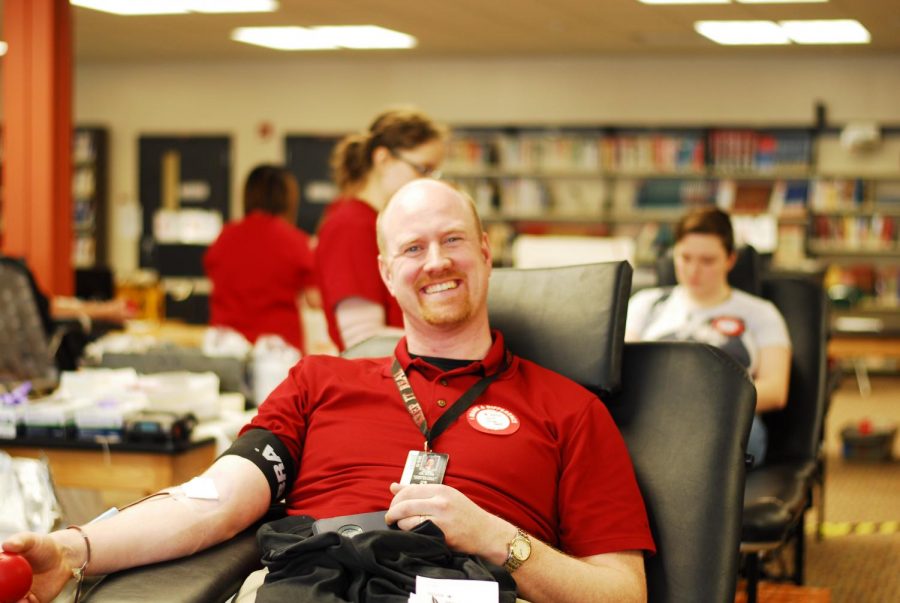 Mr. Olson, a usual donator, is excited to give again at Interact's blood drive.