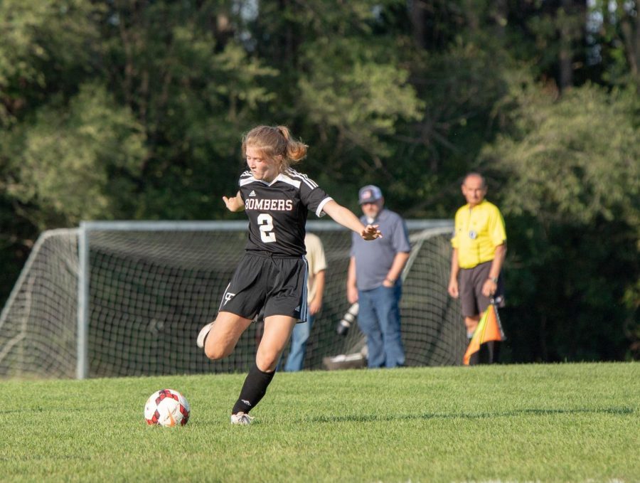 Anna Giese winds up to take one of her trademark free kicks.