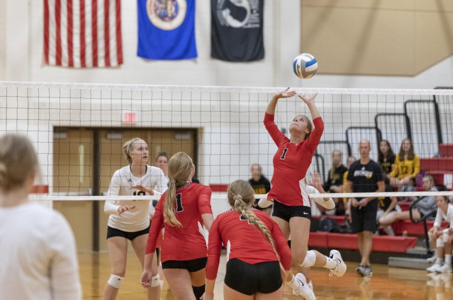 Jaci WInchell sets the ball up to Sara Twedt.