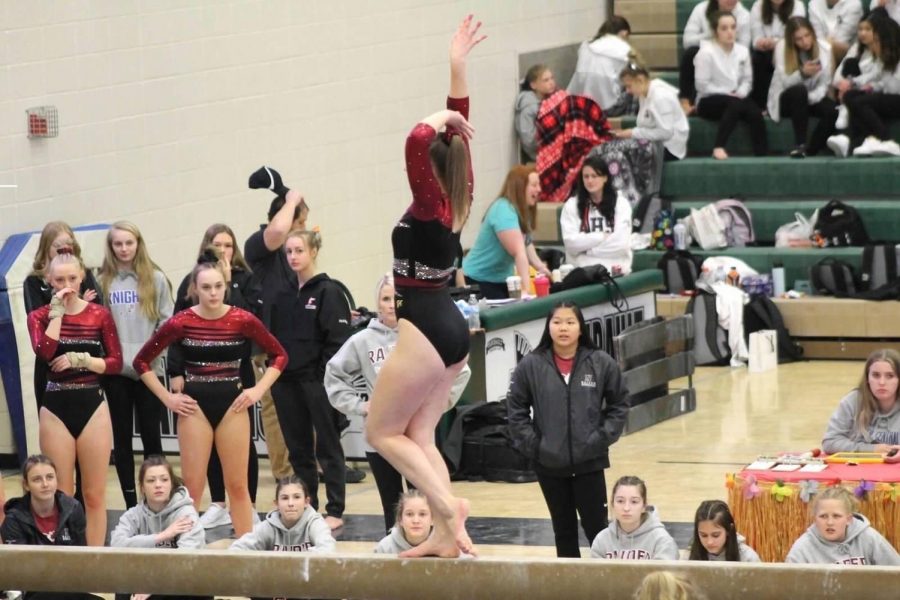 Saundra Stodden performs her beam routine at a recent competition.