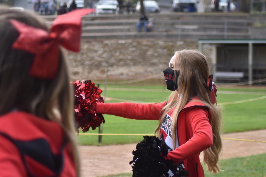 Captain Amelia Qualey leads the squad in a cheer during a Bomber home game.