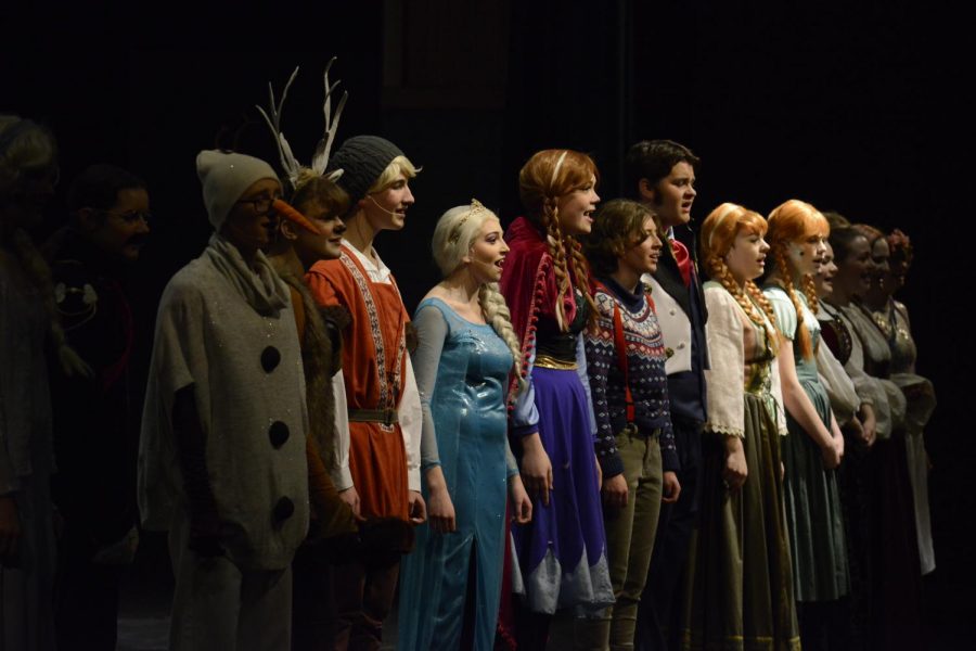 The cast of Frozen Jr. bows together at the conclusion of their performance.