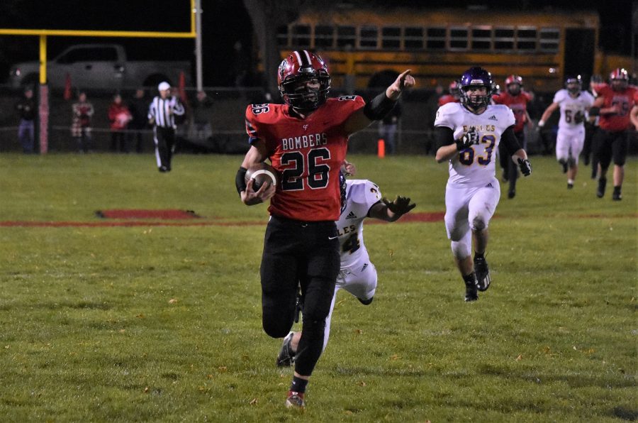 Carson Hammel runs the ball into the Cannon Falls endzone for the first score of the game. 