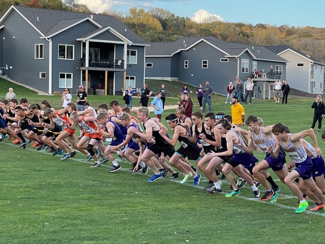 Cannon Falls cross country runners start the race alongside many other schools.