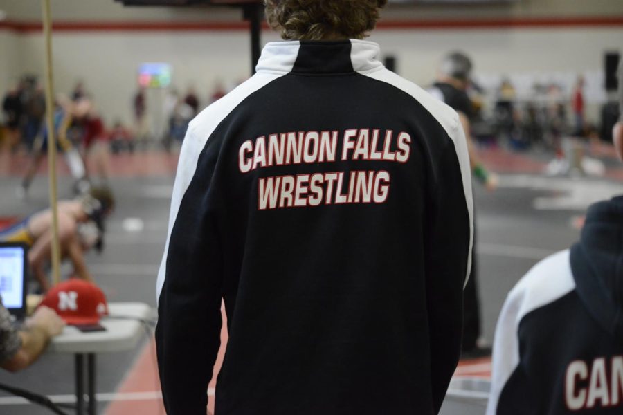 One+of+the+Cannon+Falls+wrestlers+watches+his+teammates+match.+
