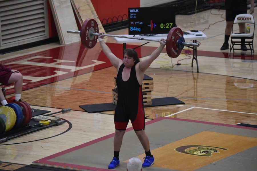 Senior John Delk successfully completes one of his lifts.