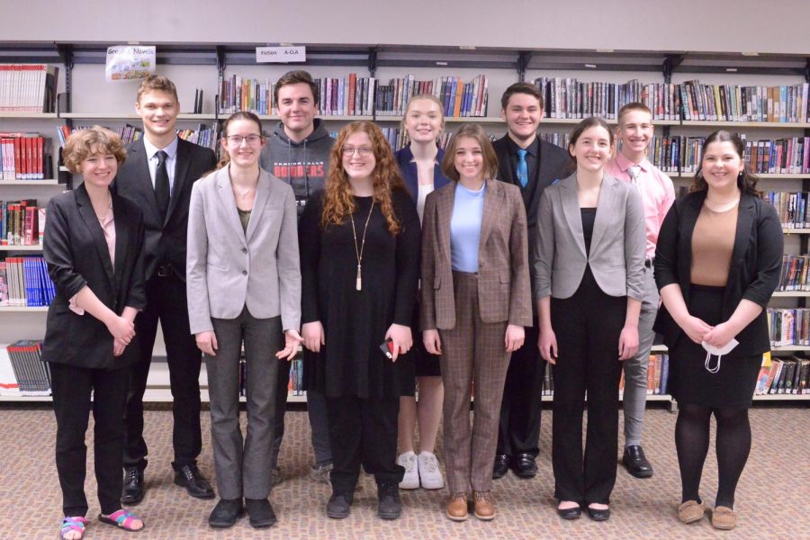 After placing at the John Marshall tournament, CF speechies pose for a picture.
