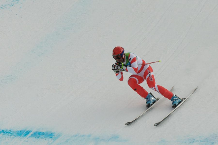 Skiers speed down the slopes in one of the many Winter Olympic events. 
