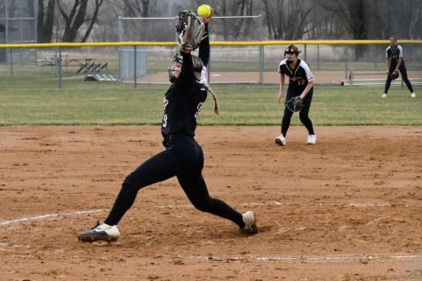 In a recent softball game, Taylor Kapp fired a pitch towards the opponent. 