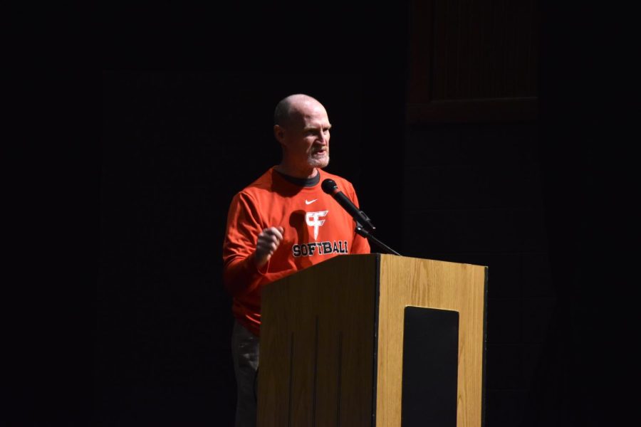 CFHS+softball+coach+Tom+Langfeldt+speaks+at+the+signing+of+Kayley+Frenette+and+Abby+Breuer.