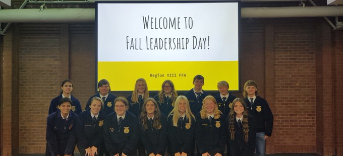 Leadership day attendees pose for a picture in their FFA garb.