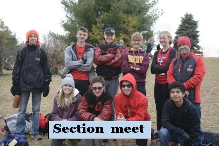 The section Bomber cross country team takes a team picture