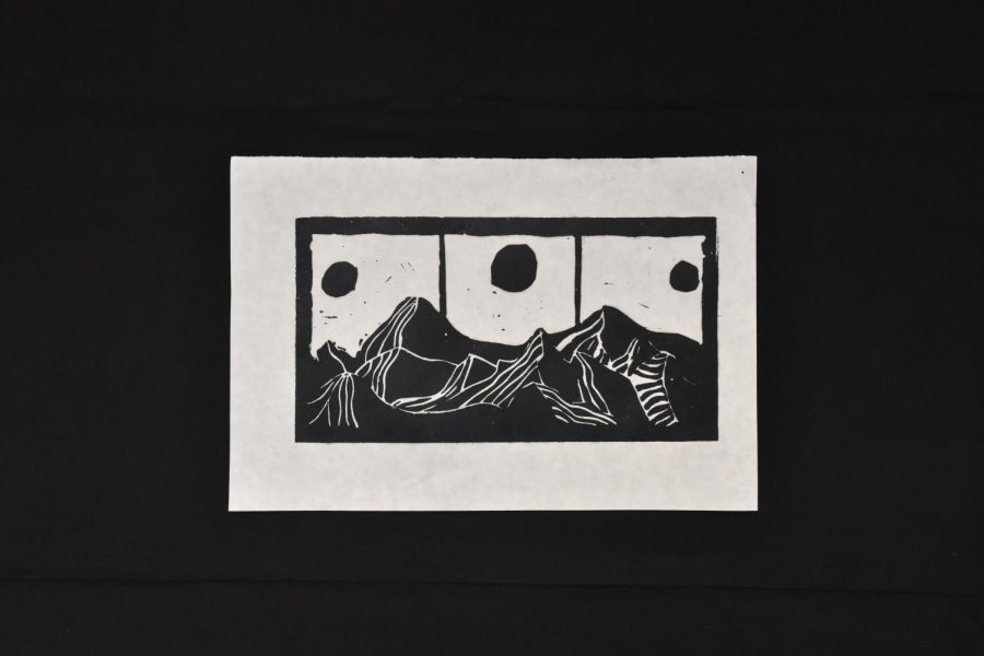 Madysen King made this ink print of mountains and the moon.