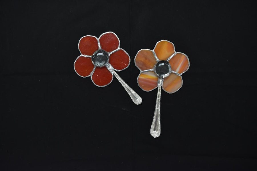 Madysen King created these flowers out of stained glass and spoons.
