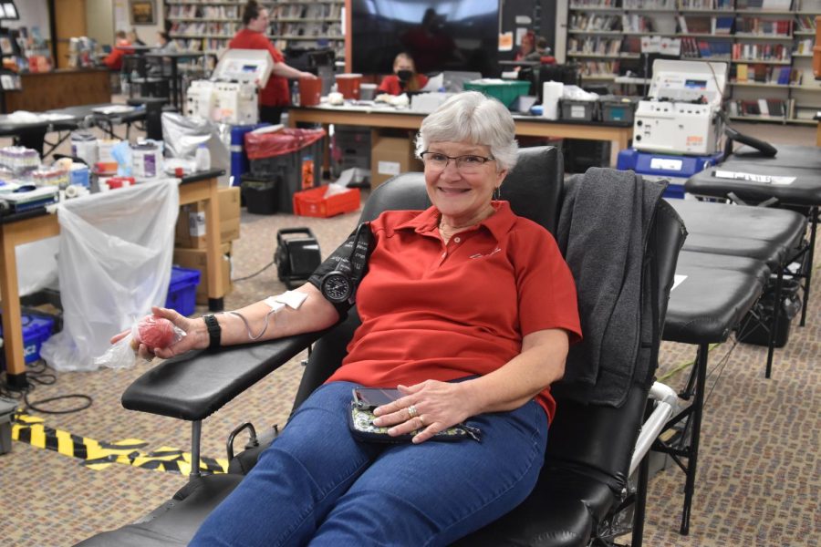 Cannon Falls High School staff member, Jan Holt, donates blood at the drive.