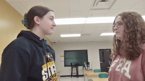 Things get violent as Lauren Ritz and Grace Miller argue whether it is GIF or GIF