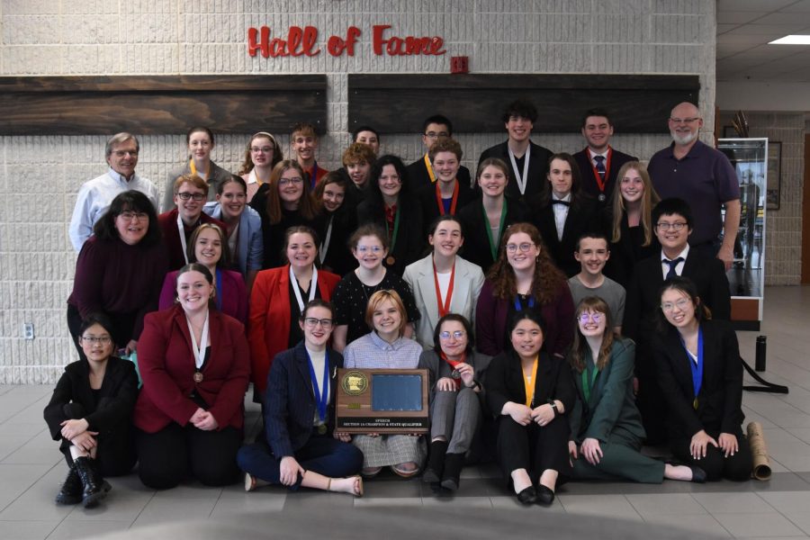 All speakers from the Cannon Falls Speech Team that competed at sections posed along with coaches Holly Winget, Cal Vande Hoef, and John Fogarty.