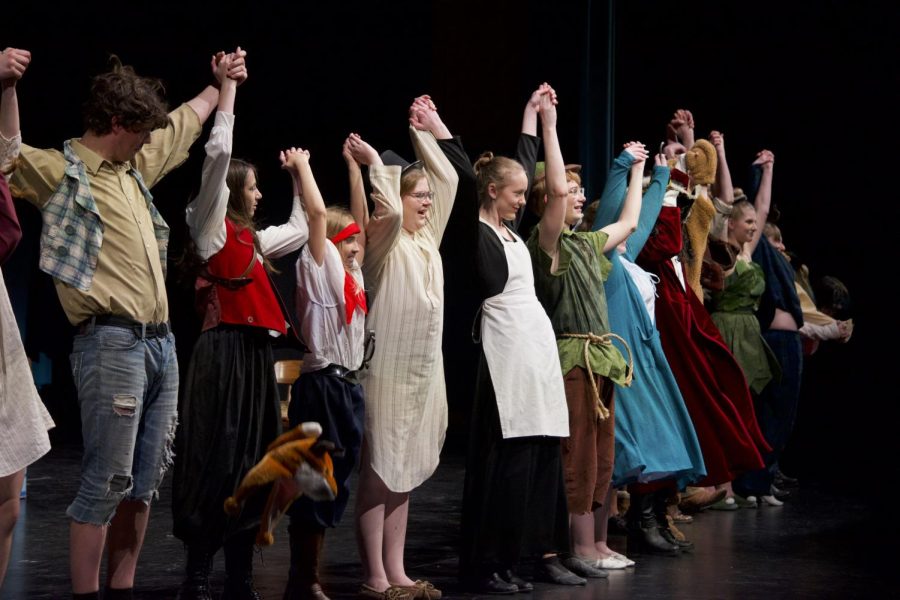 The cast and crew bow after their first performance on Thursday, May 11th. 
