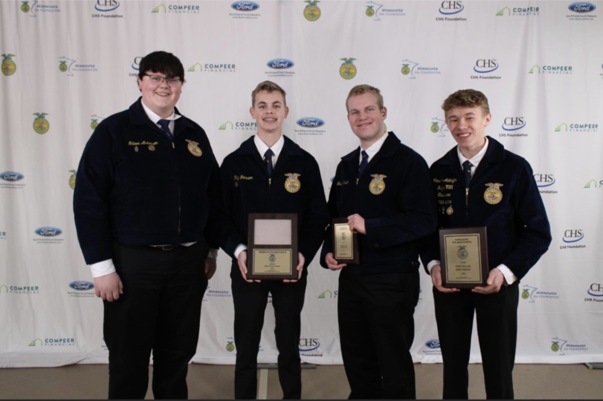 The Cannon Falls Crops team held up their plaques after the awards ceremony last April.