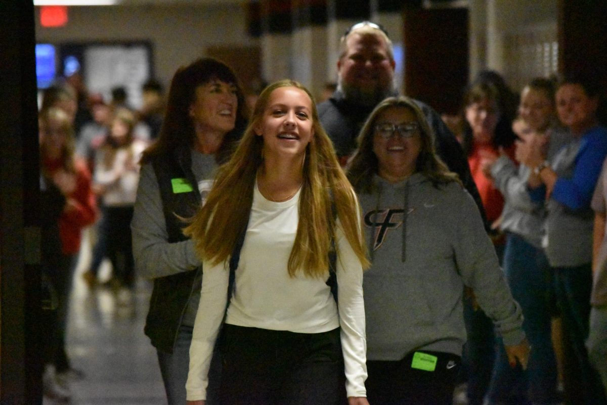 Livia Tennessen gets a rousing sendoff by the students as she heads to state