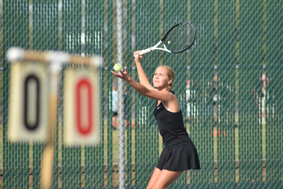 Livia Tennessen winds up for a big serve.