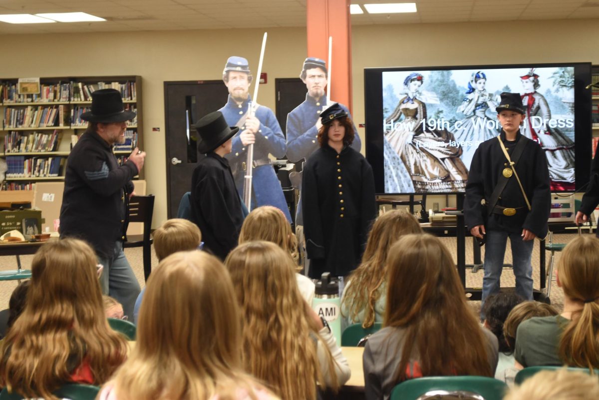 Sabella Jensen got to try on a Civil War uniform.