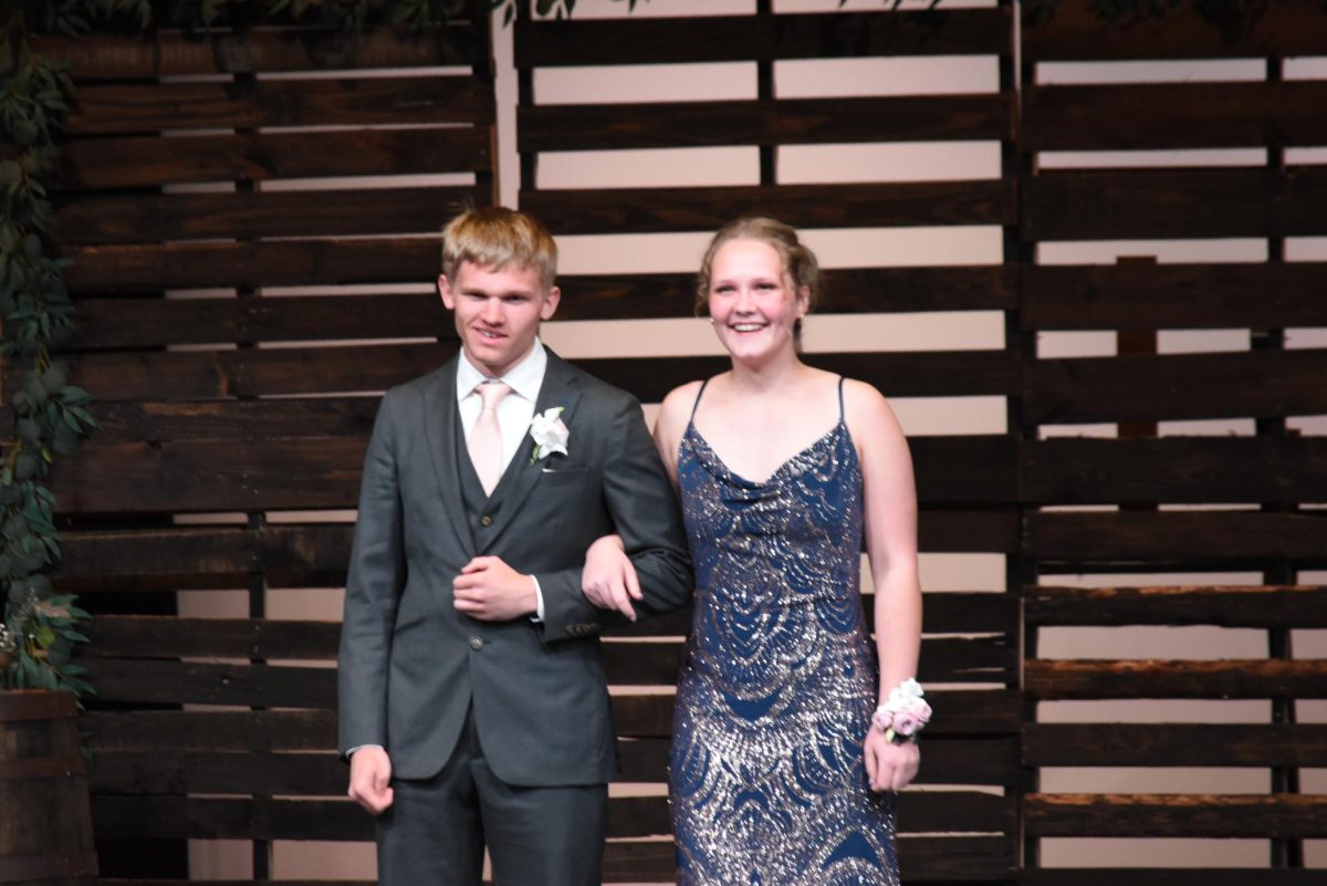 Jacob Bigalk and Lily Bahr prepare for their night of fun along with the other prom attendants. 