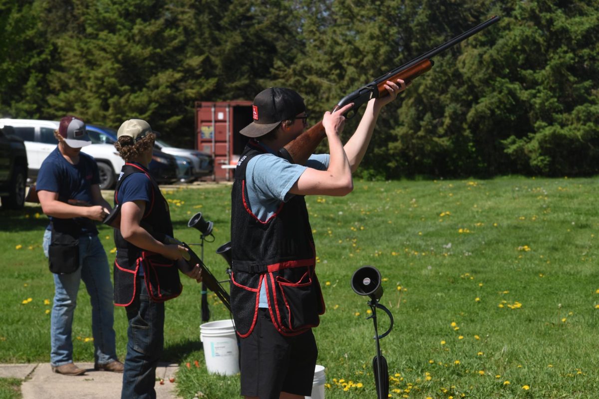 Colten Litschke looks down the range after his shot 